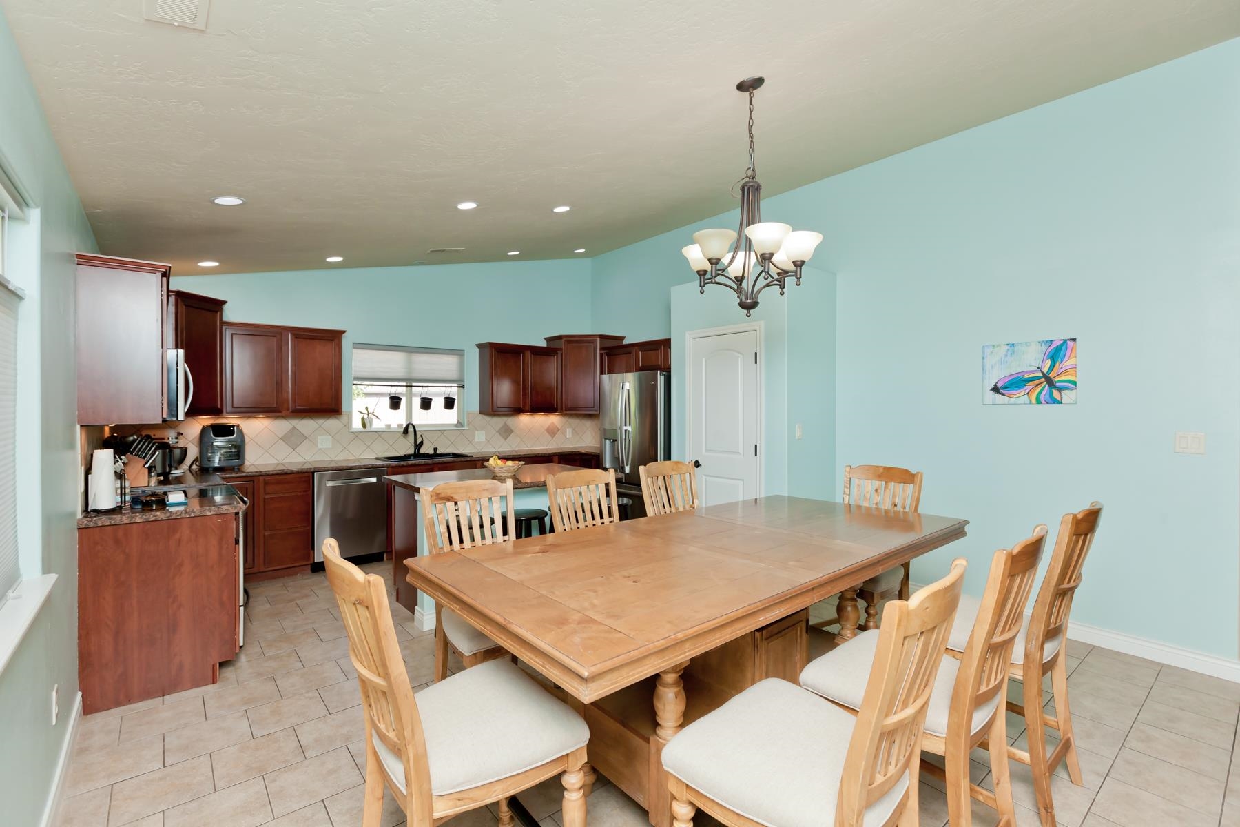 1037 Wingate Drive Fruita, CO 81521 - Photo 7 of 42 a view of a dining room with furniture