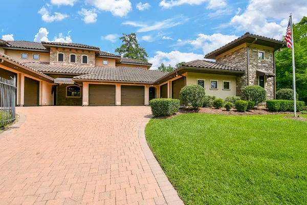 a view of a backyard with a patio