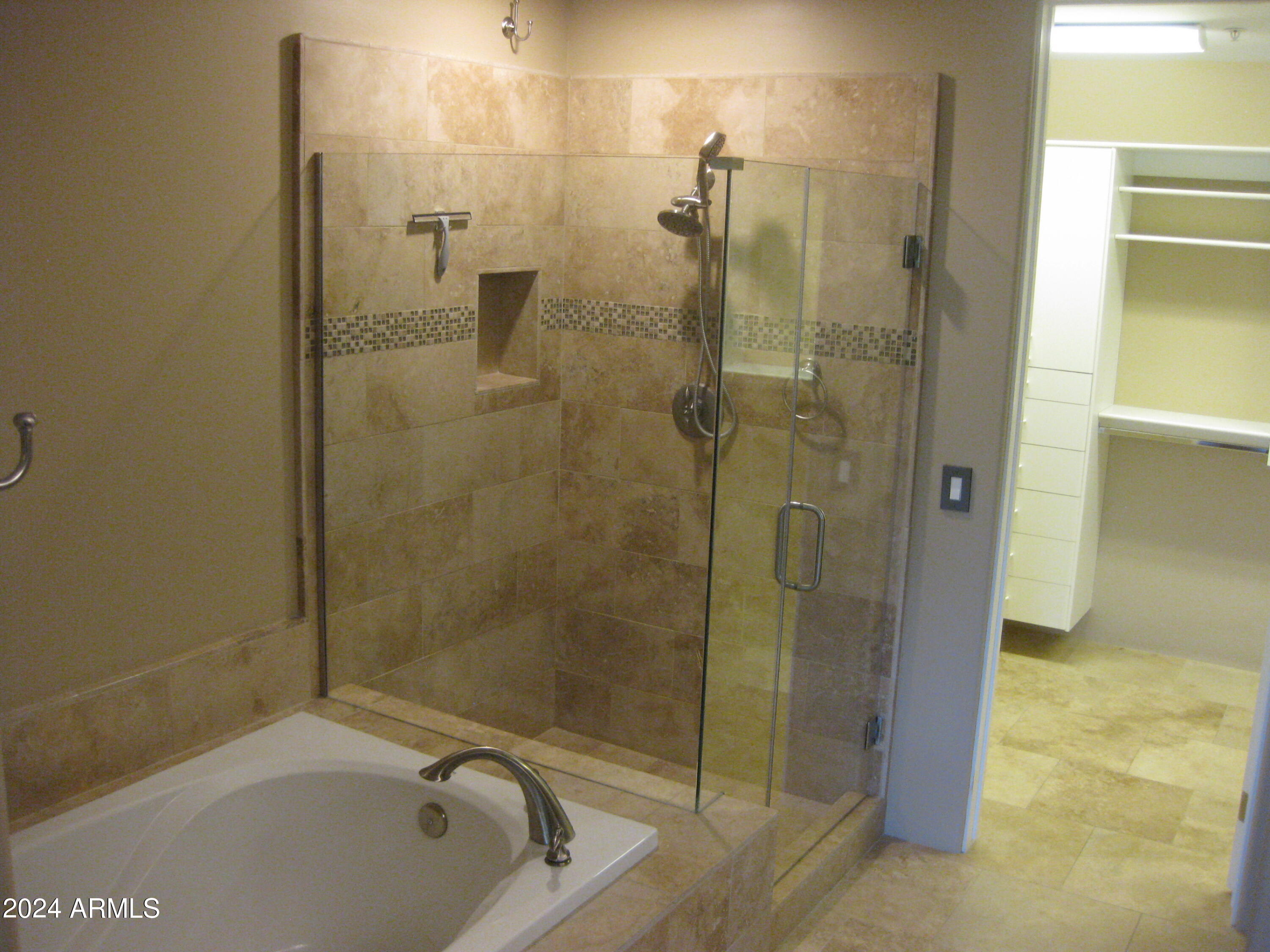 36600 North Cave Creek Road, Unit C20 Cave Creek, AZ 85331 - Photo 11 of 32 a bathroom with a bathtub and a shower