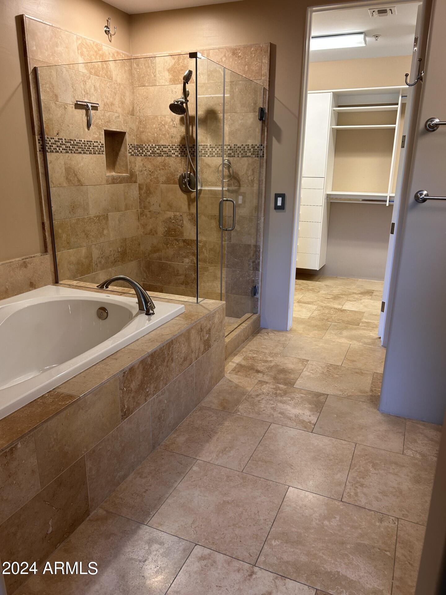 36600 North Cave Creek Road, Unit C20 Cave Creek, AZ 85331 - Photo 12 of 32 a bathroom with a bathtub and shower