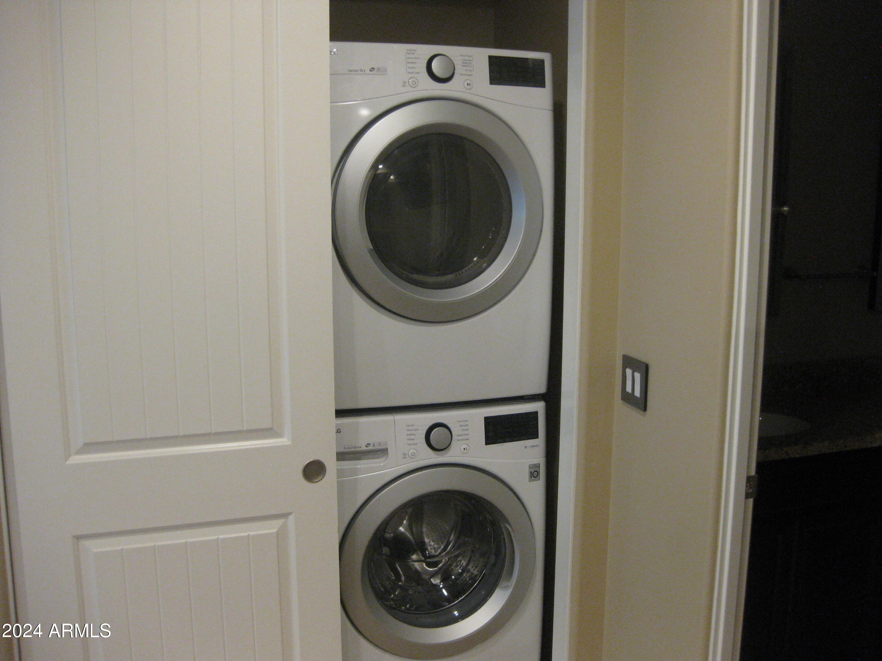 36600 North Cave Creek Road, Unit C20 Cave Creek, AZ 85331 - Photo 6 of 32 a view of a hallway with washer and dryer