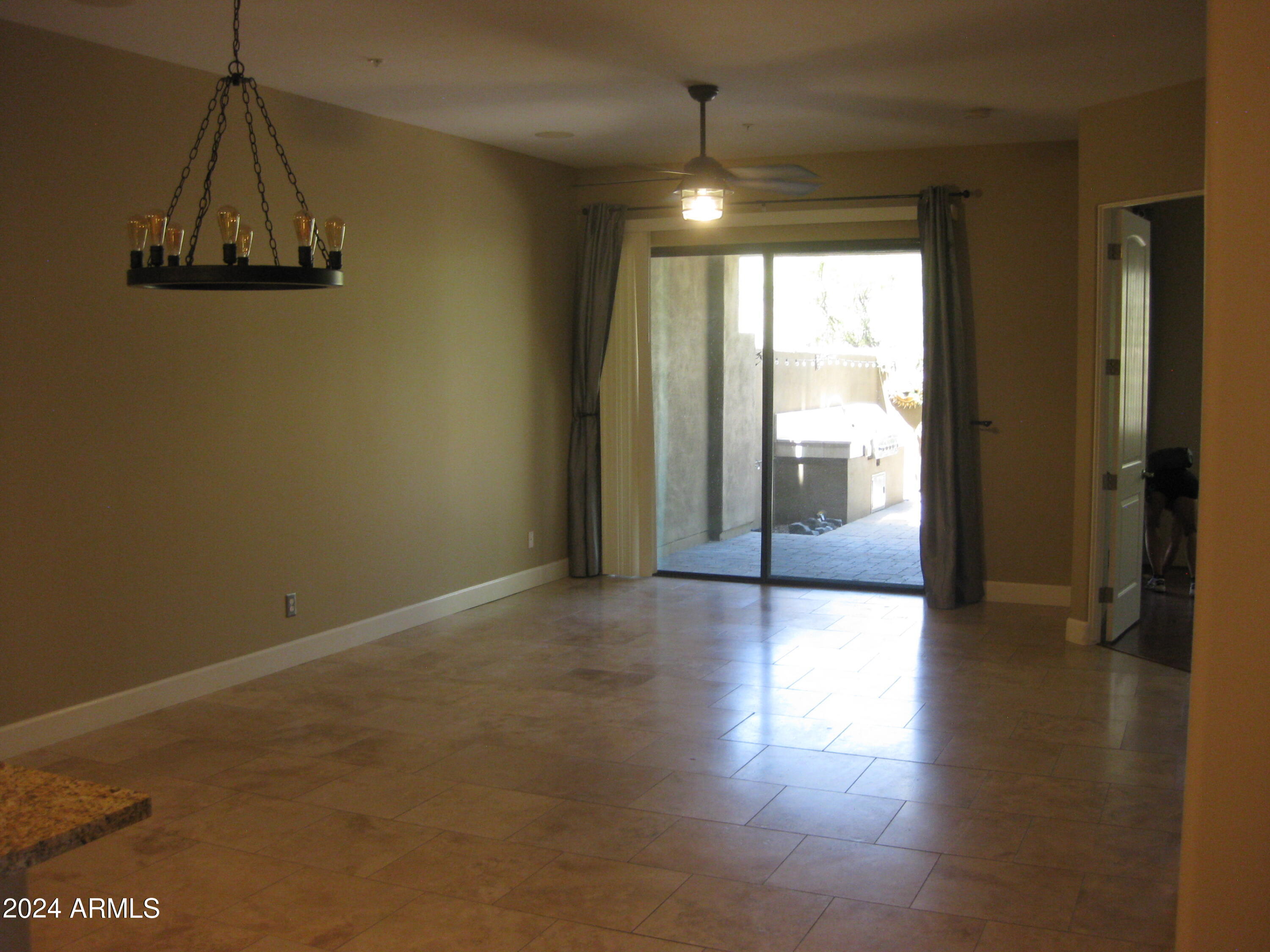 36600 North Cave Creek Road, Unit C20 Cave Creek, AZ 85331 - Photo 7 of 32 a view of a room with wooden floor and windows