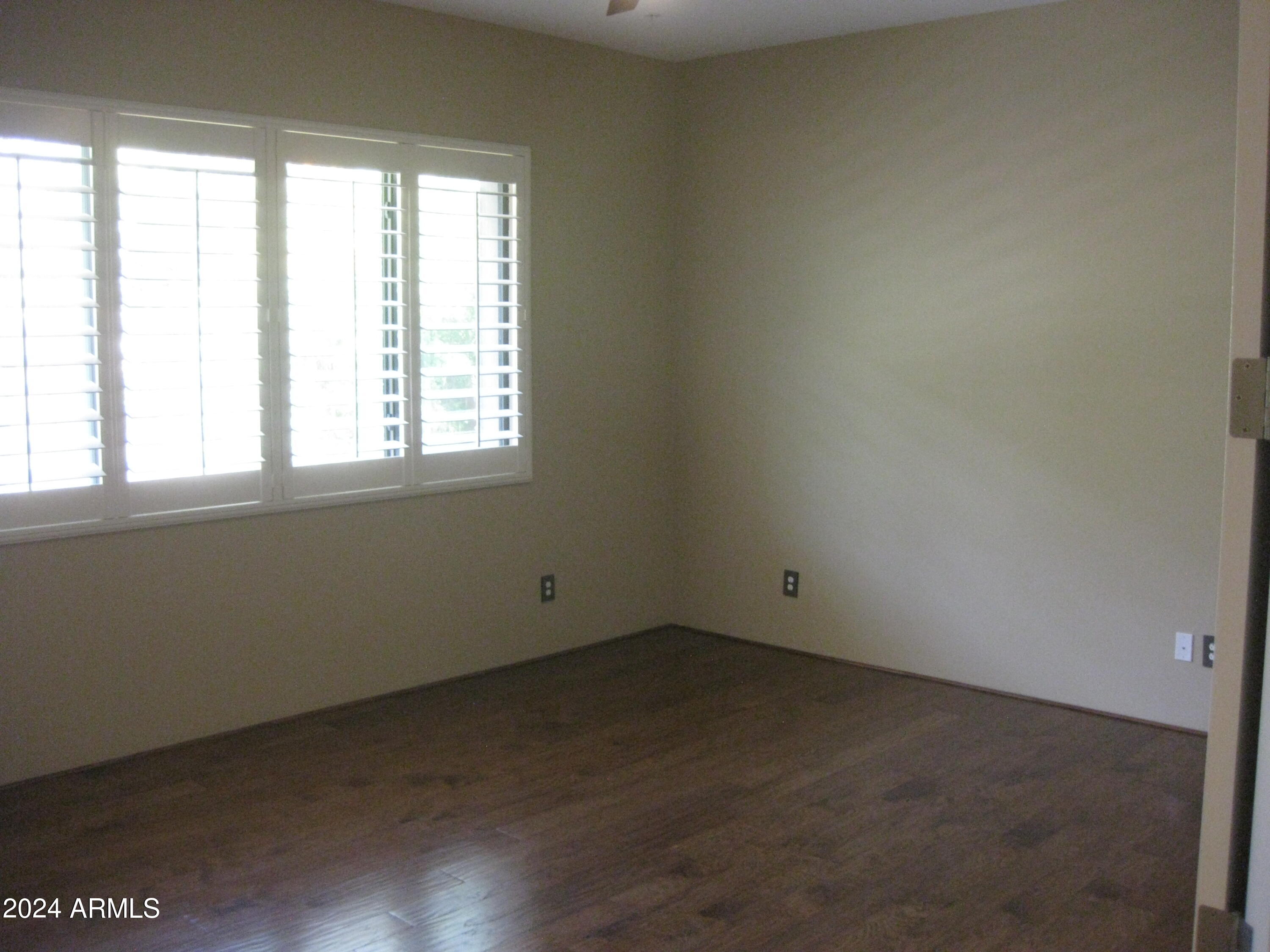 36600 North Cave Creek Road, Unit C20 Cave Creek, AZ 85331 - Photo 9 of 32 an empty room with a window