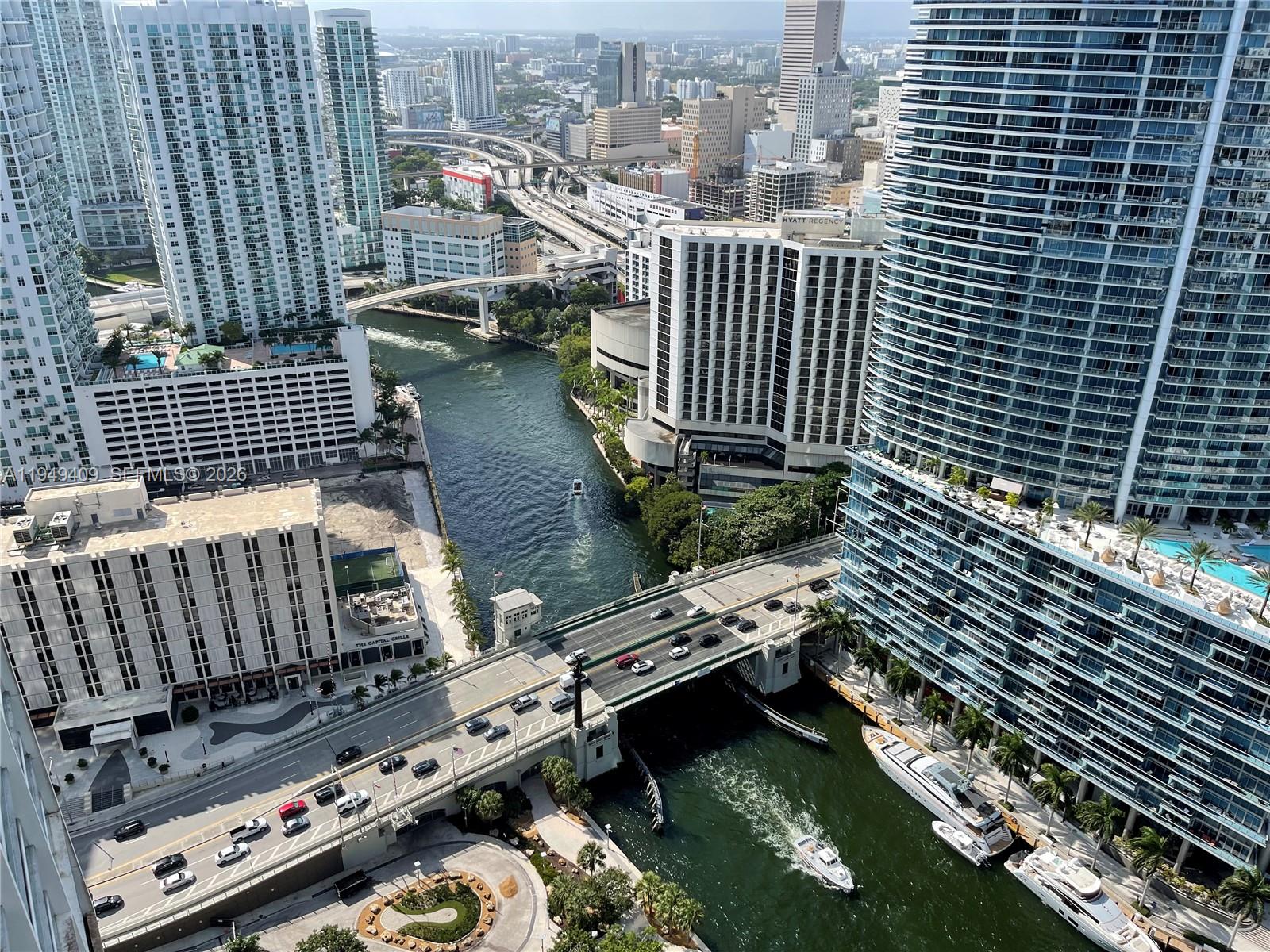 465 Brickell Avenue, Unit 4006 Miami, FL 33131 - Photo 2 of 25 a view of a balcony with wooden floor