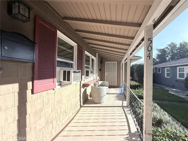a front view of a house with a porch