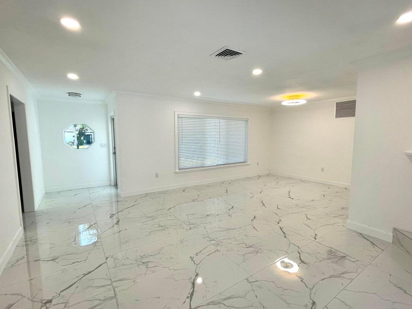 861 Northwest 7th Street Boca Raton, FL 33486 - Photo 6 of 18 a view of an empty room