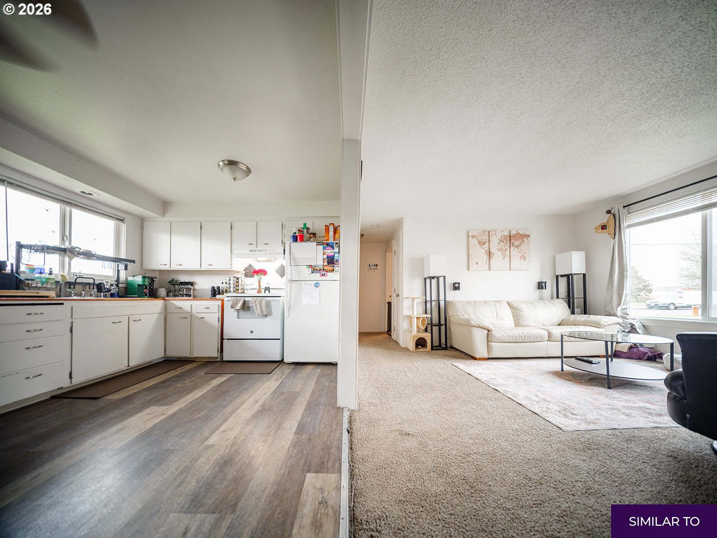 920 18th Avenue Southwest Albany, OR 97321 - Photo 17 of 19 a kitchen with white cabinets and white appliances