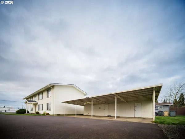 a house with trees in front of it