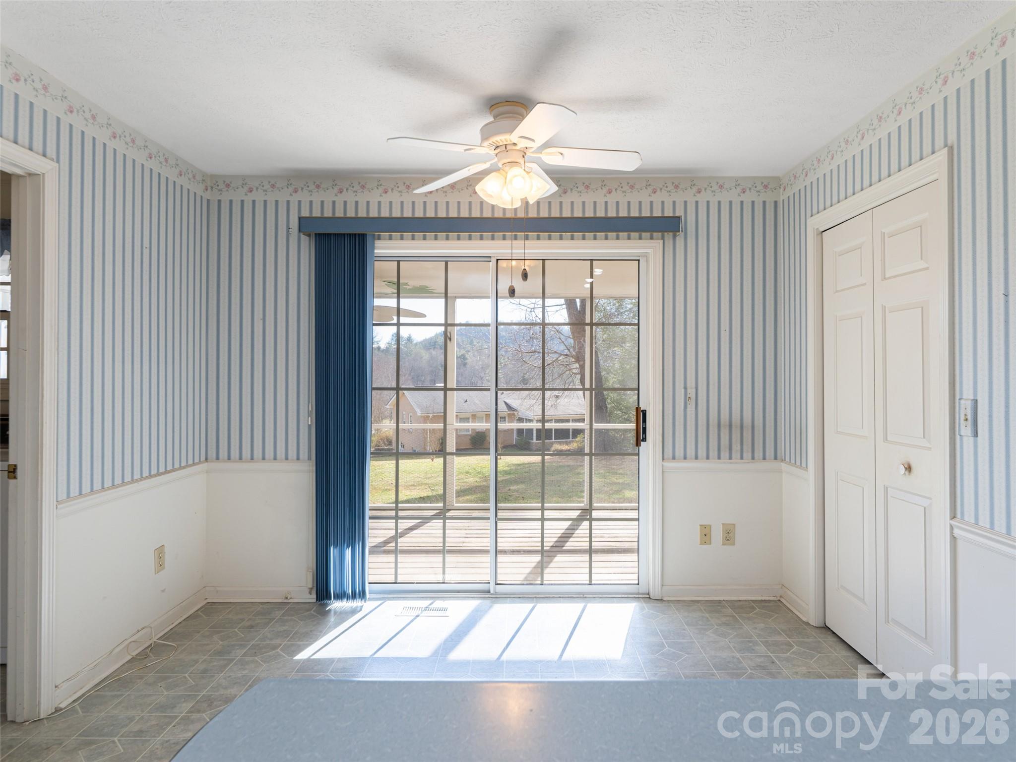 120 Burge Mountain Road Hendersonville, NC 28792 - Photo 15 of 44 a view of an empty room with a window