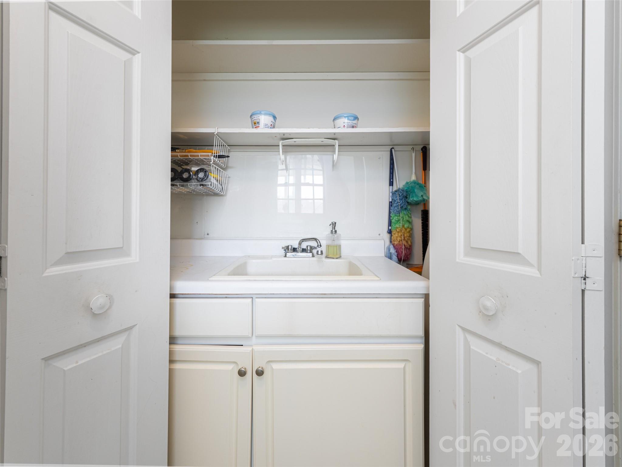 120 Burge Mountain Road Hendersonville, NC 28792 - Photo 19 of 44 a bathroom with a sink and a mirror