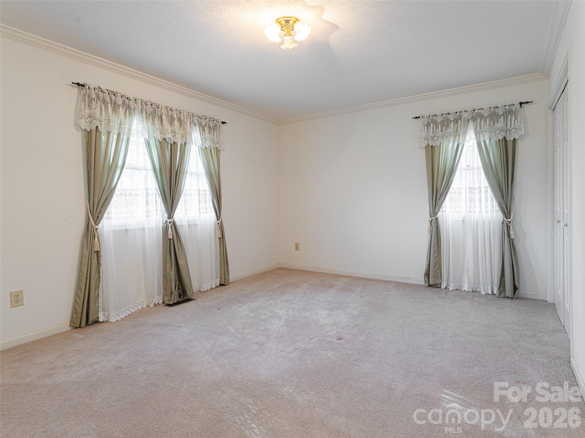 120 Burge Mountain Road Hendersonville, NC 28792 - Photo 29 of 44 a view of empty room with window