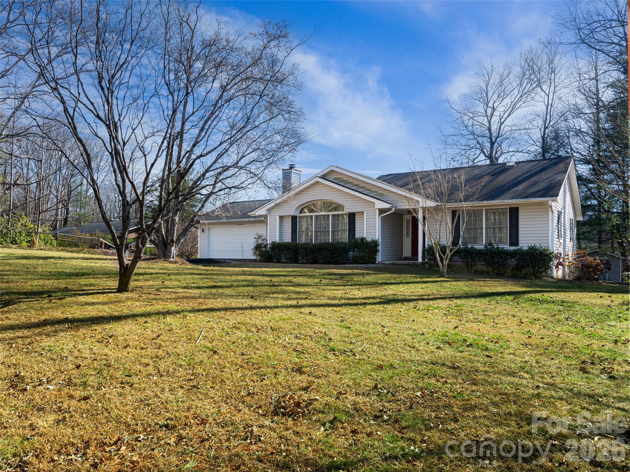 120 Burge Mountain Road Hendersonville, NC 28792 - Photo 44 of 44 a house with swimming pool in front of it