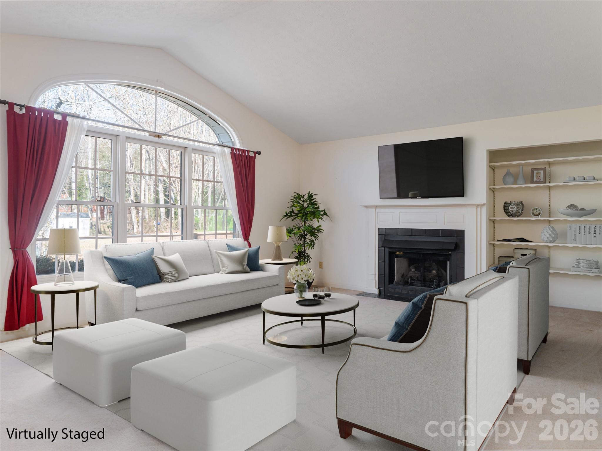 120 Burge Mountain Road Hendersonville, NC 28792 - Photo 7 of 44 a living room with furniture a fireplace and a large window