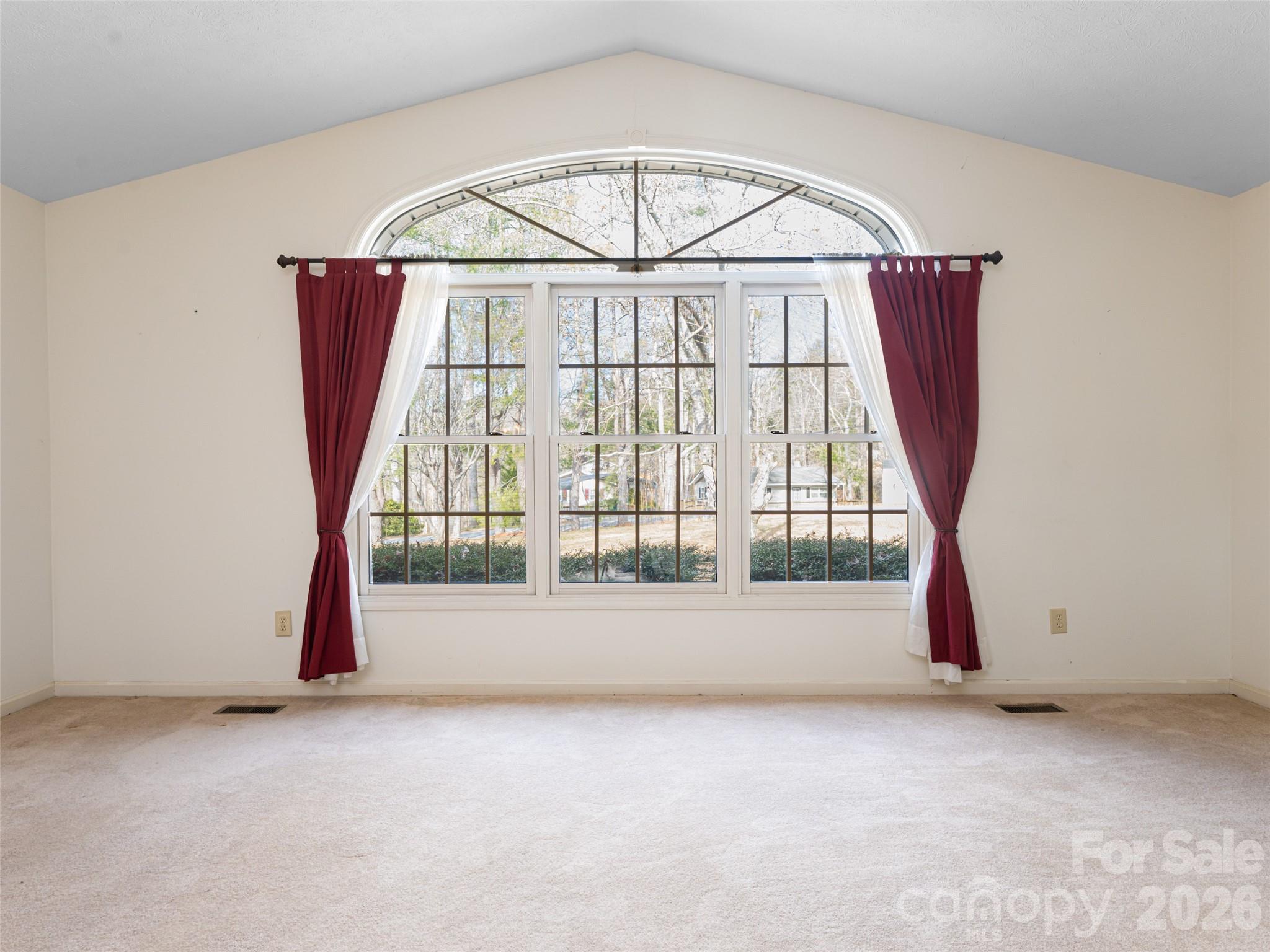 120 Burge Mountain Road Hendersonville, NC 28792 - Photo 8 of 44 an empty room with windows