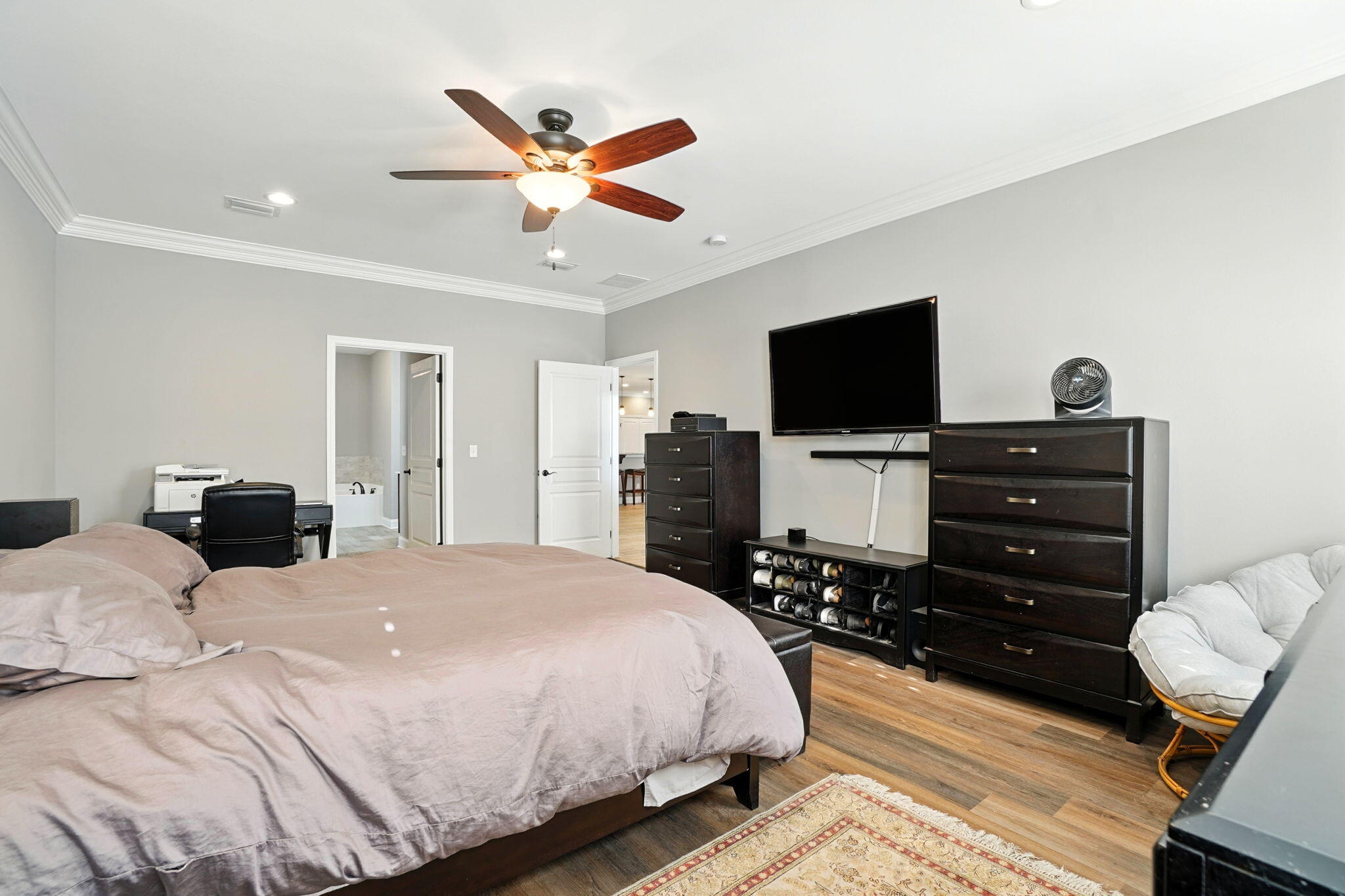 212 Eleases Crossing Crestview, FL 32539 - Photo 20 of 40 a bedroom with a bed and a flat screen tv