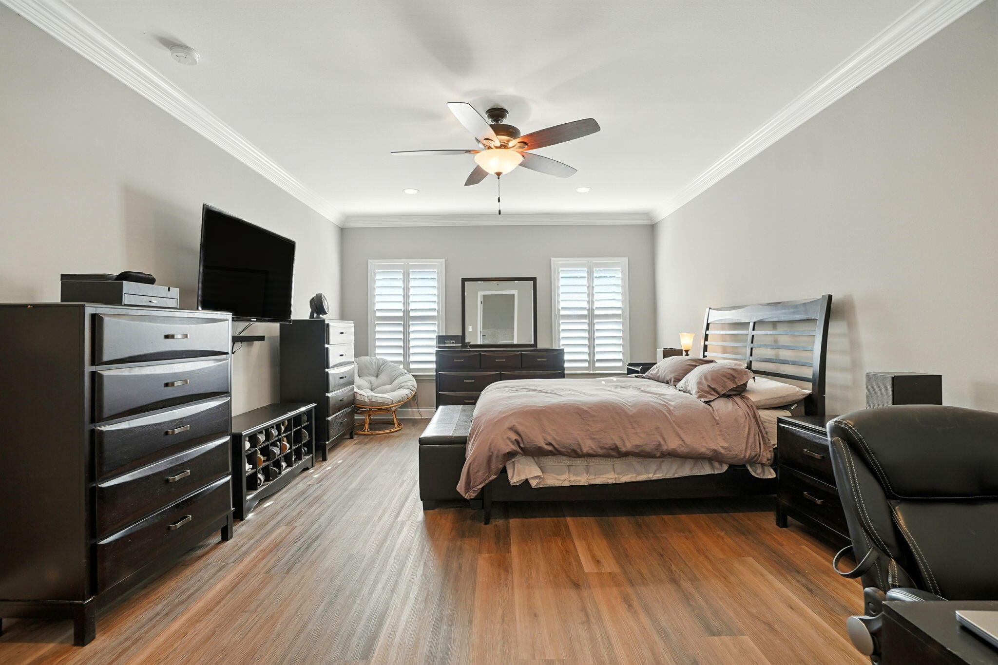 212 Eleases Crossing Crestview, FL 32539 - Photo 21 of 40 a bedroom with a bed and a flat screen tv