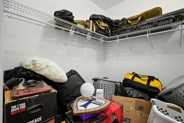 a living room with furniture and air hockey table