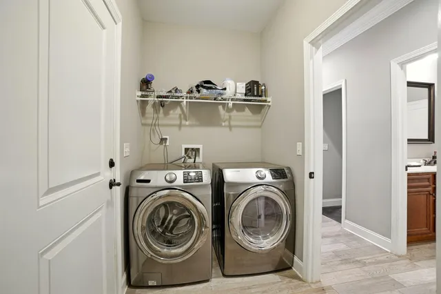 a view of washer and dryer in a utility room