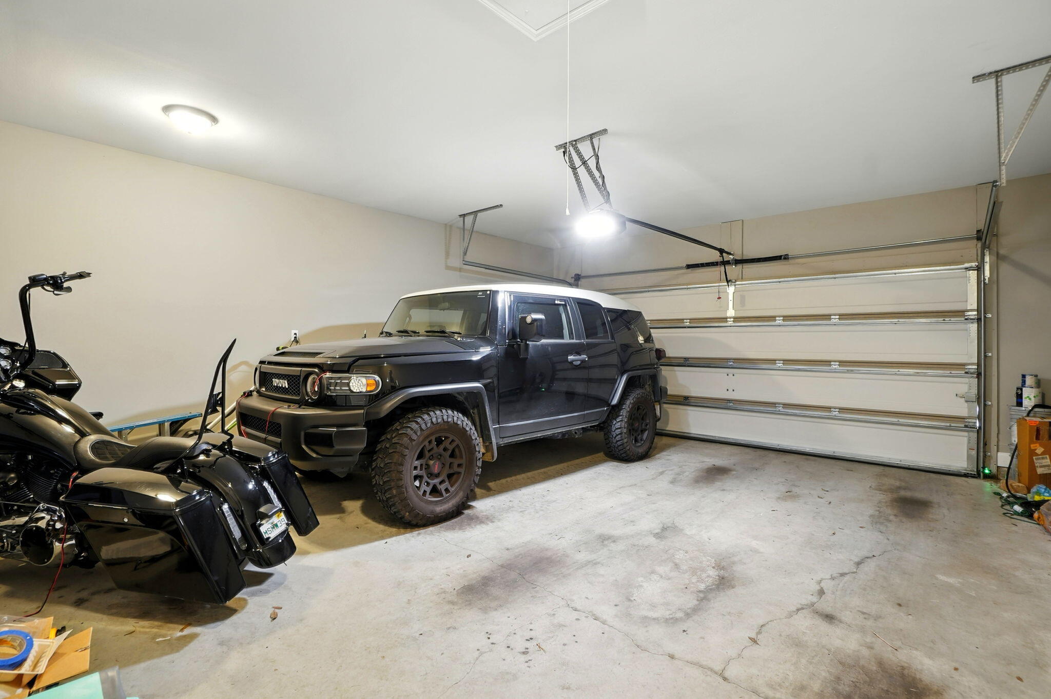 212 Eleases Crossing Crestview, FL 32539 - Photo 31 of 40 a view of a garage with parked cars
