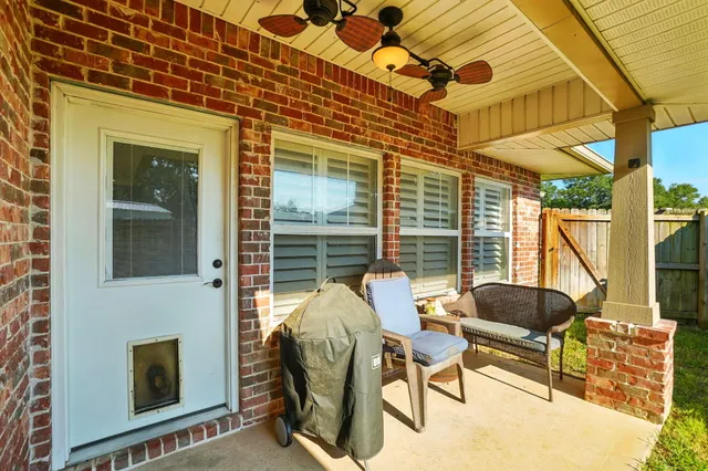 a view of an outdoor space with porch and furniture