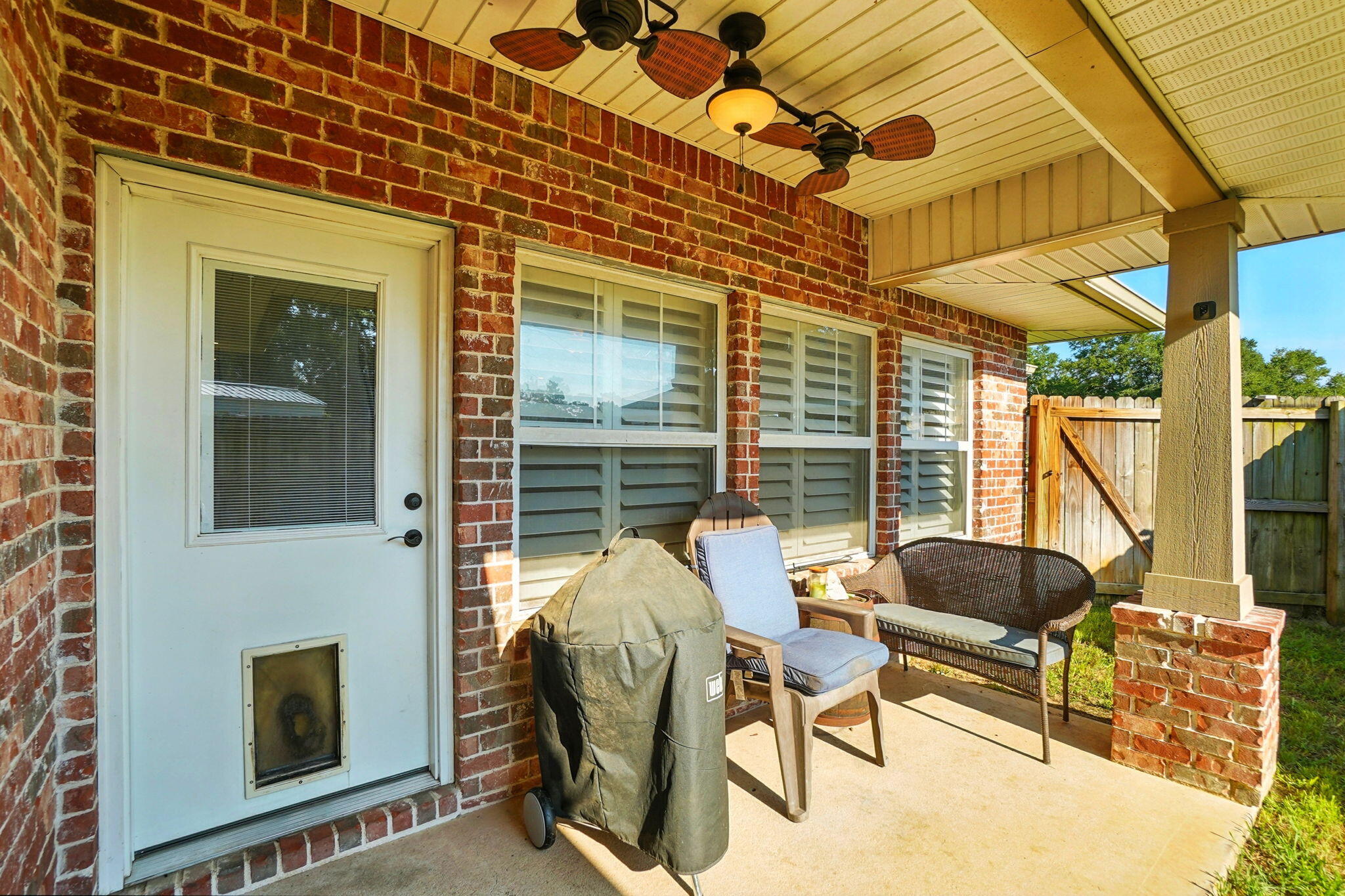 212 Eleases Crossing Crestview, FL 32539 - Photo 34 of 40 a view of an outdoor space with porch and furniture