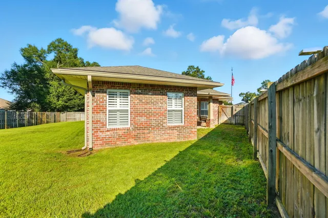 a view of a backyard with a garden