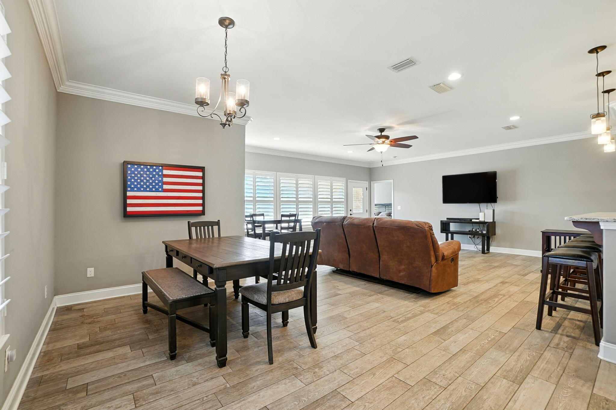 212 Eleases Crossing Crestview, FL 32539 - Photo 4 of 40 a view of a dining room with furniture window and wooden floor