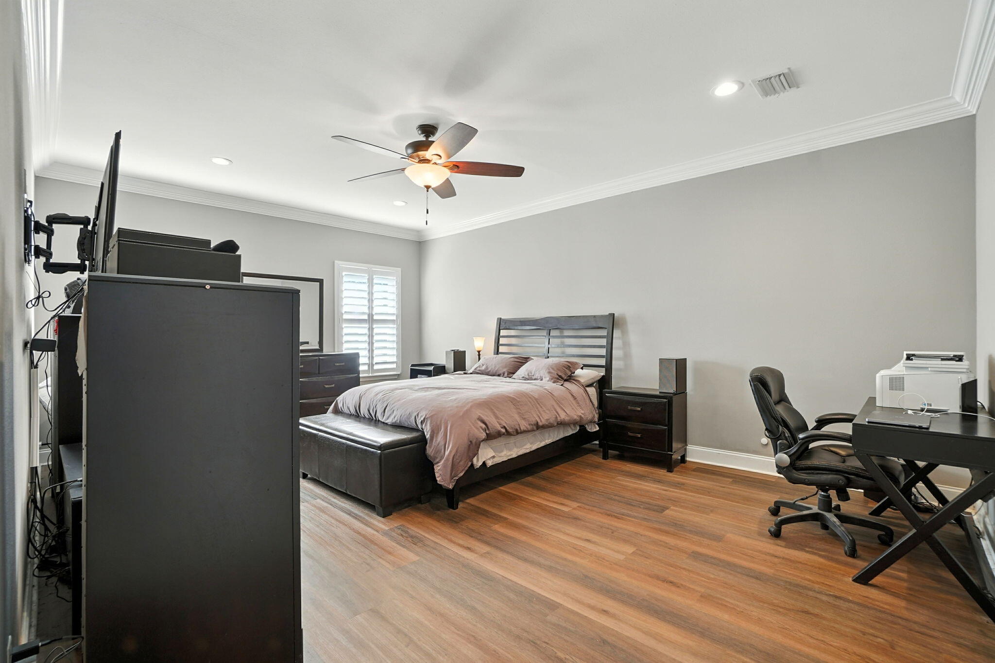 212 Eleases Crossing Crestview, FL 32539 - Photo 6 of 40 a bedroom with a bed a table and chair