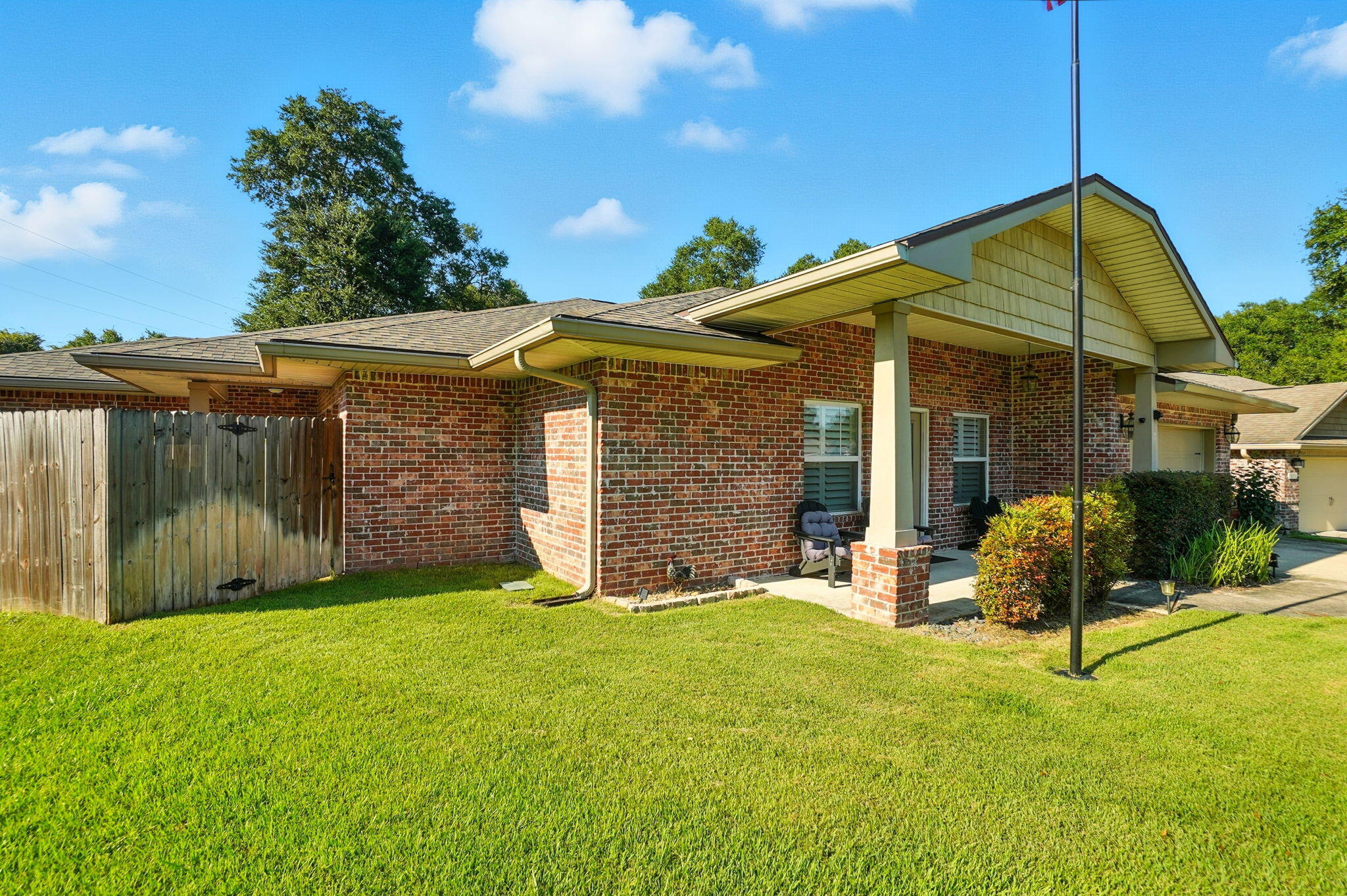 212 Eleases Crossing Crestview, FL 32539 - Photo 8 of 40 a view of a house with backyard and porch