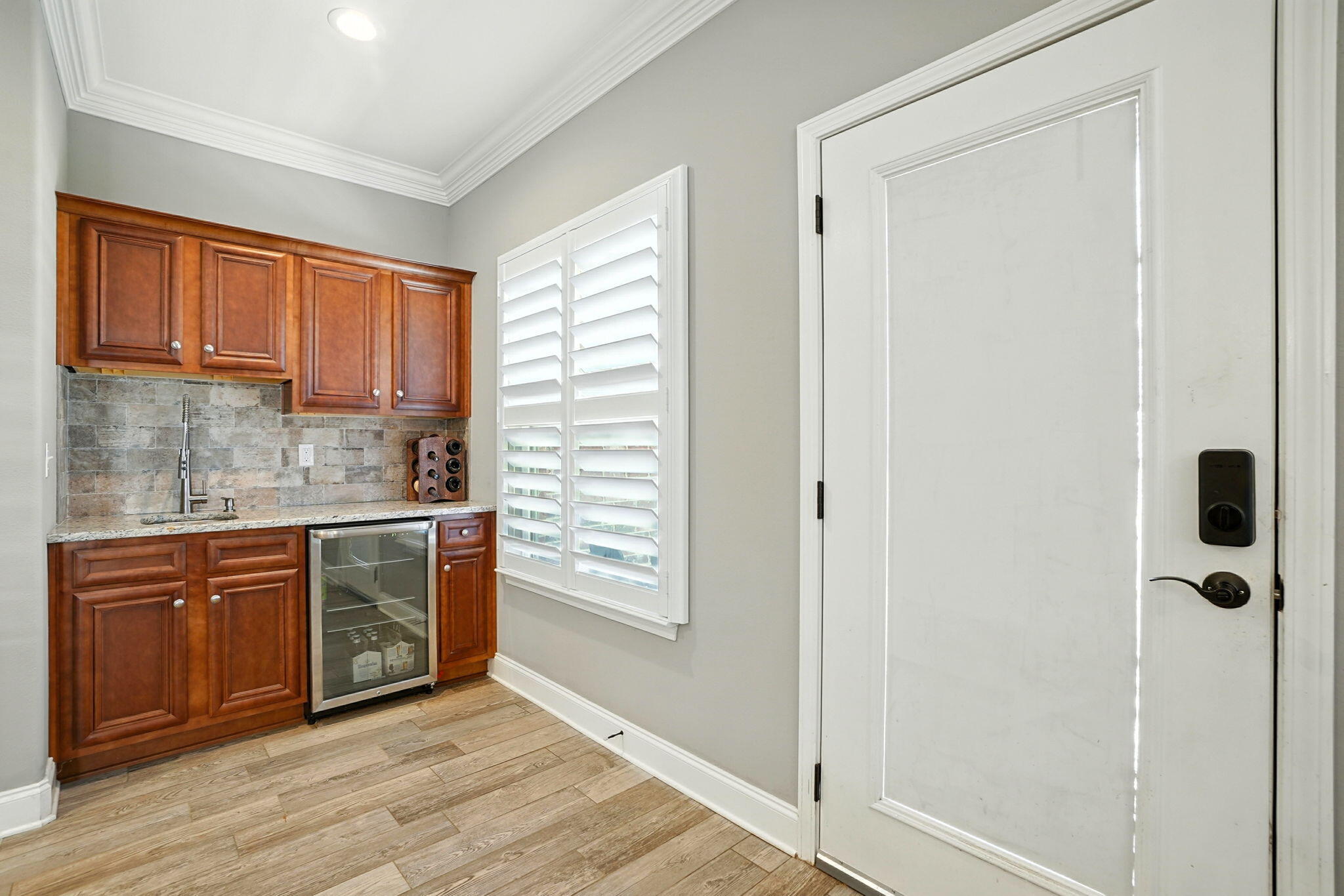 212 Eleases Crossing Crestview, FL 32539 - Photo 10 of 40 a kitchen with stainless steel appliances granite countertop a refrigerator and a sink
