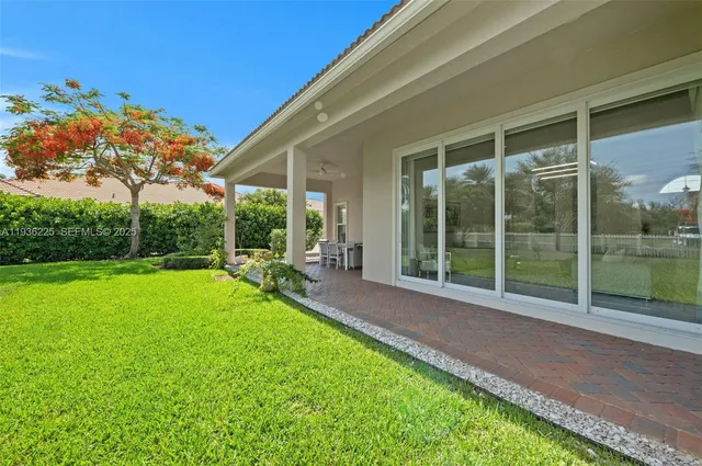 a view of backyard with green space