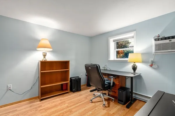 a workspace with furniture and lamp