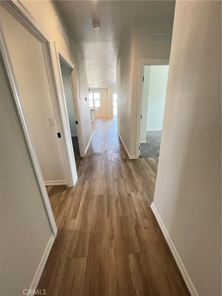 1550 Rimpau, Unit 42 Corona, CA 92881 - Photo 9 of 22 wooden floor in a gallery