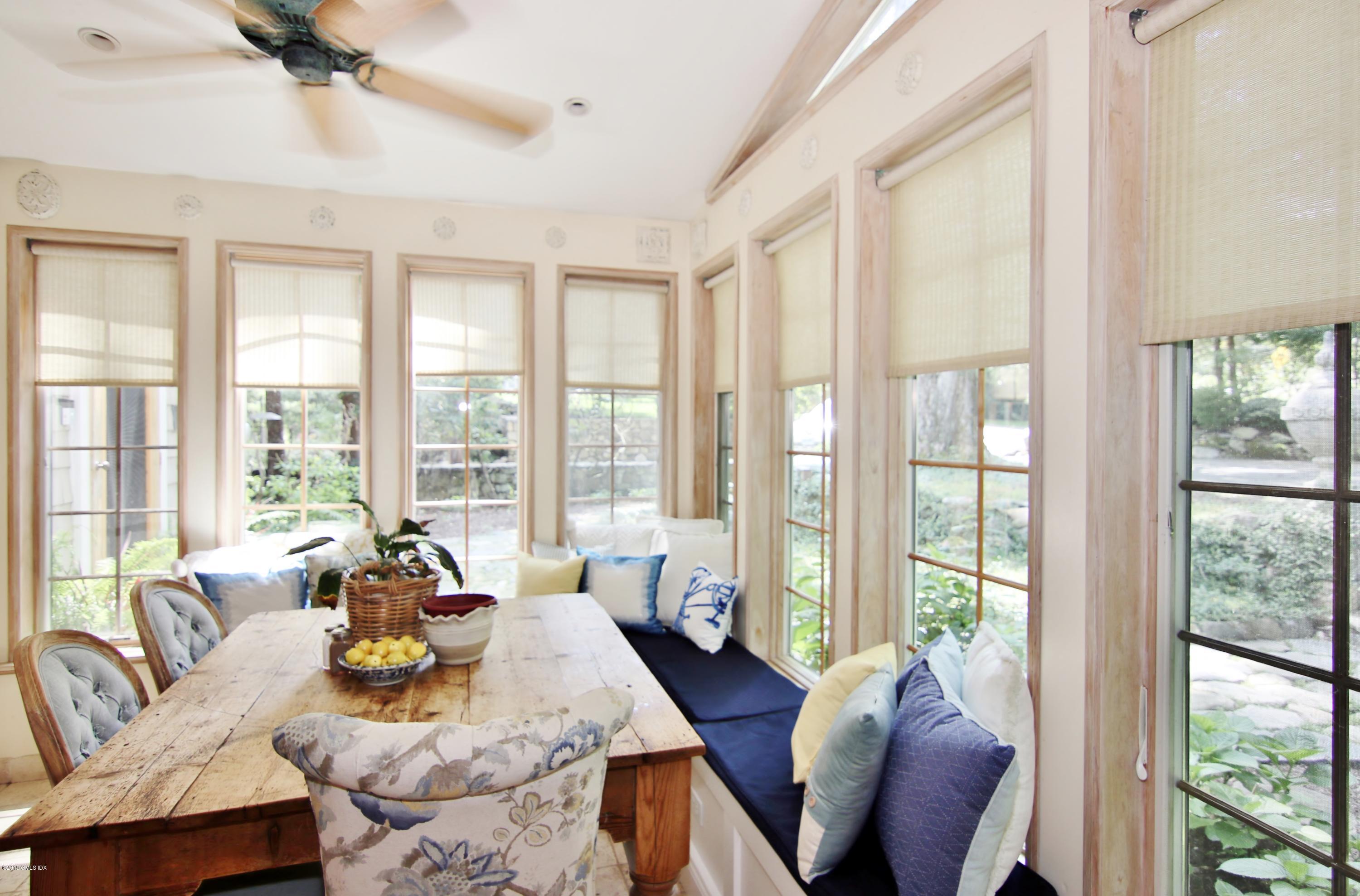349 Haviland Road Stamford, CT 06903 - Photo 18 of 40 Built-in banquette & windows galore!