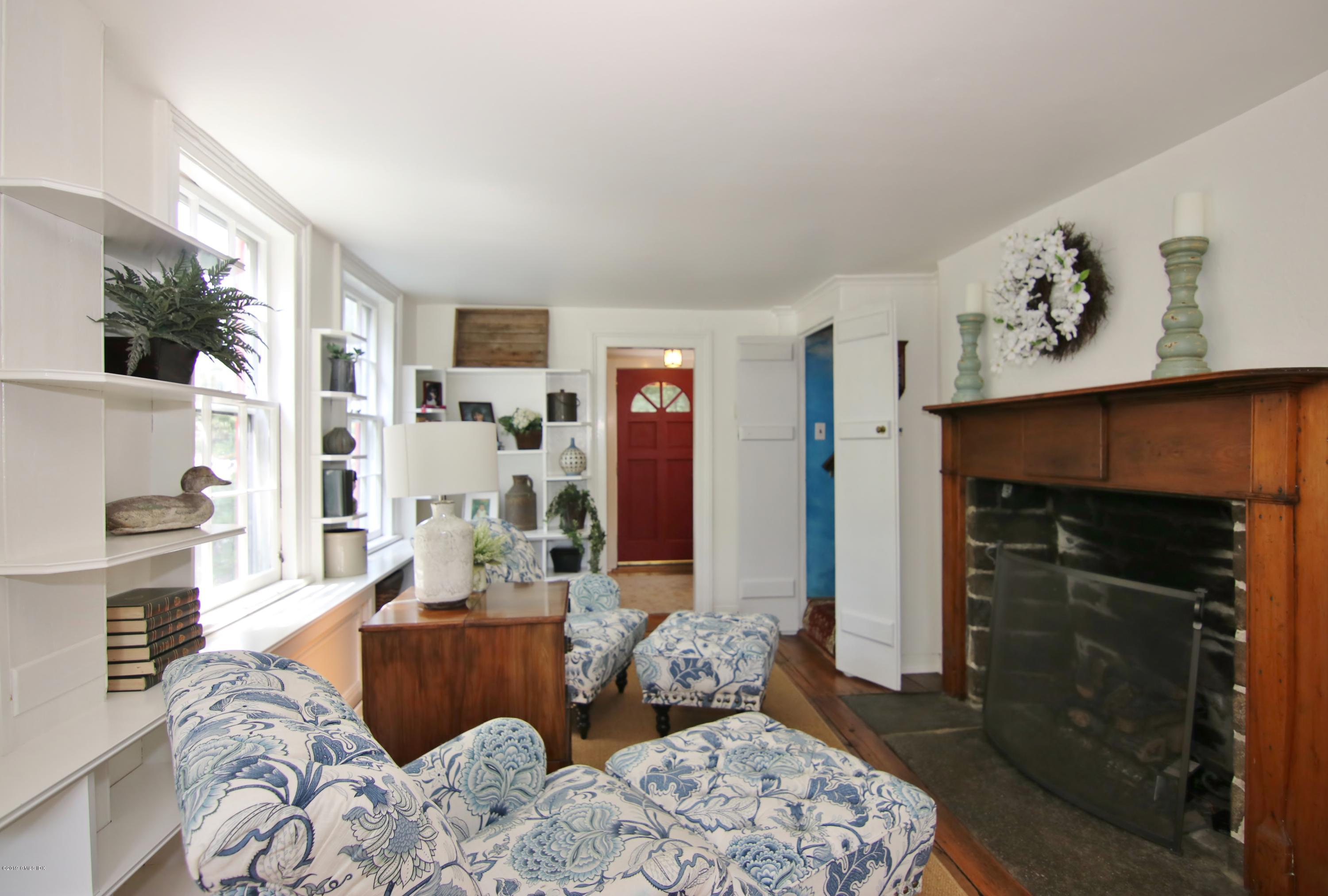349 Haviland Road Stamford, CT 06903 - Photo 6 of 40 Built-ins and gas fireplace