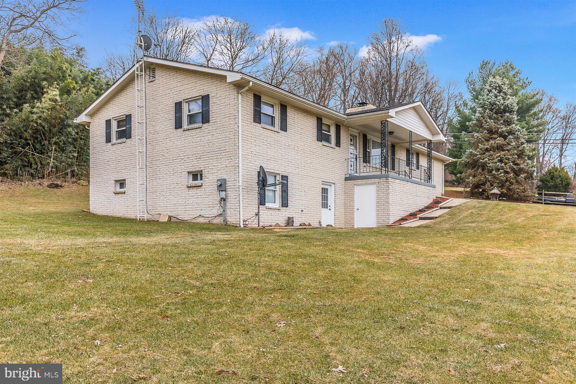 4406 Teen Barnes Road Frederick, MD 21703 - Photo 1 of 30 a view of a house with a yard