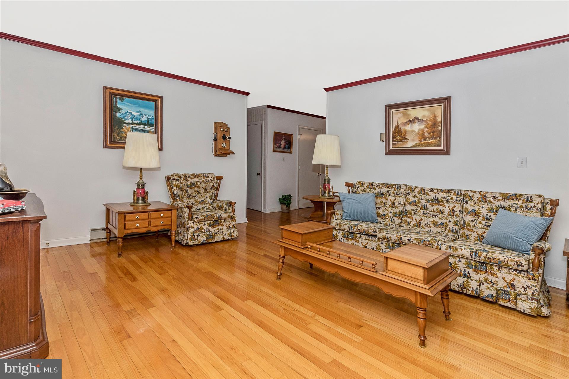 4406 Teen Barnes Road Frederick, MD 21703 - Photo 9 of 30 a living room with furniture and a wooden floor