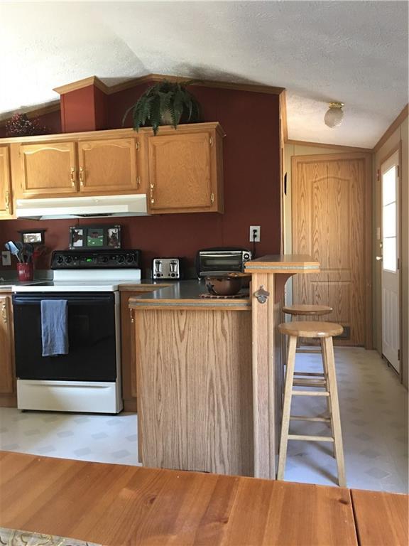 59 Cleve Tripp Road Poland, ME 04274 - Photo 7 of 33 Kitchen with Bar Stools