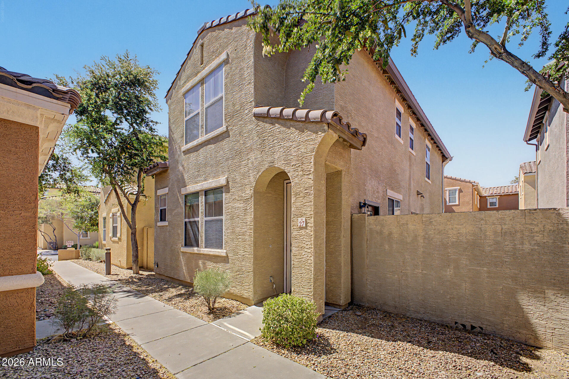 451 South Hawes Road, Unit 27 Mesa, AZ 85208 - Photo 1 of 27 a front view of a house