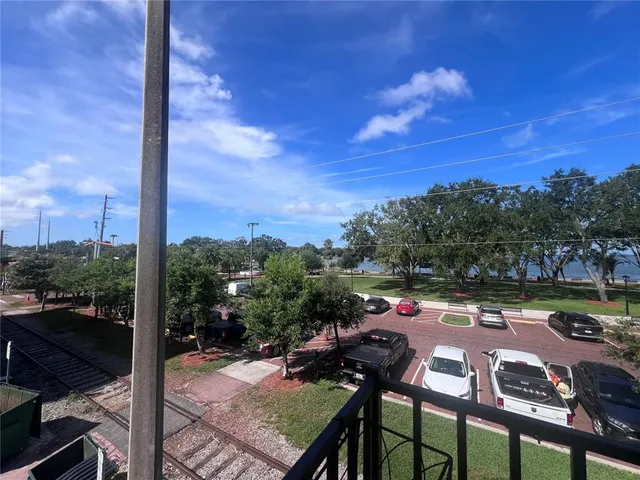a view of a patio with a table chairs and a table