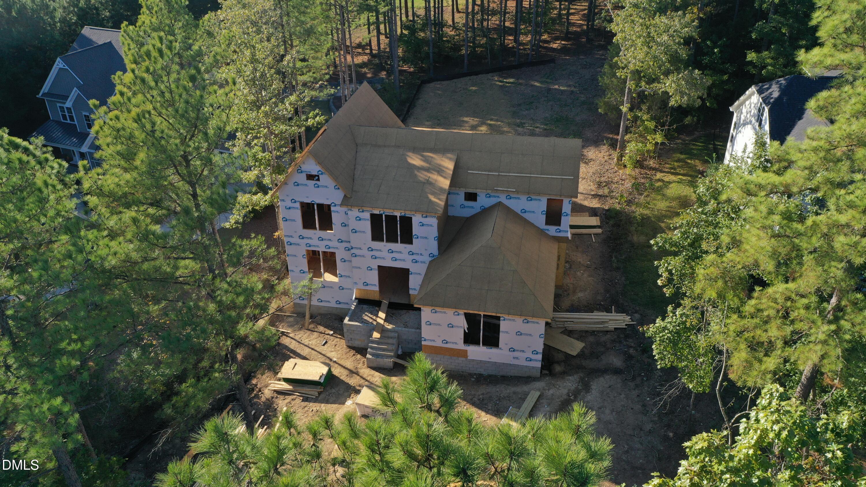 9 High Ridge Lane Pittsboro, NC 27312 - Photo 3 of 25 an aerial view of a house with yard