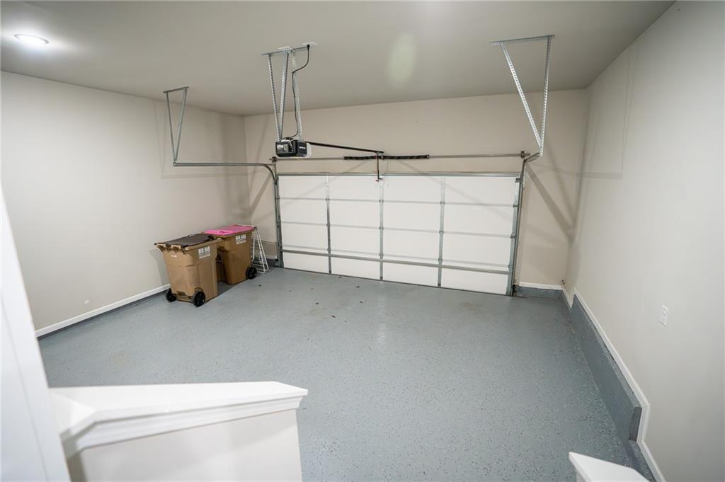 2215 Manor Pointe Drive Cumming, GA 30041 - Photo 15 of 25 a utility room with dryer and washer