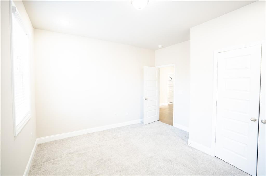 2215 Manor Pointe Drive Cumming, GA 30041 - Photo 19 of 25 a view of an empty room