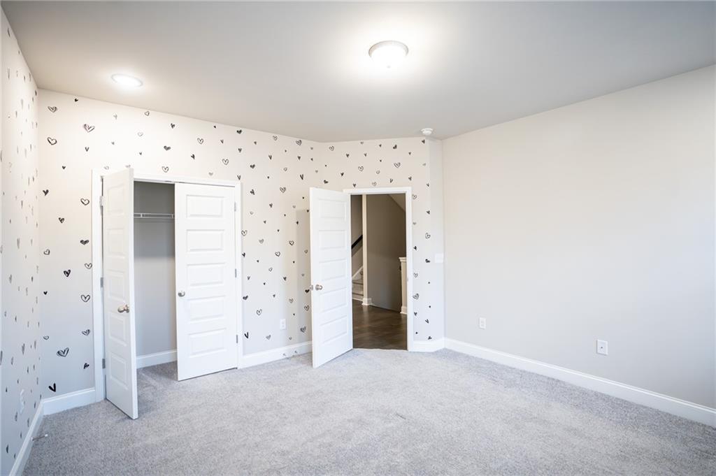 2215 Manor Pointe Drive Cumming, GA 30041 - Photo 22 of 25 an empty room with window