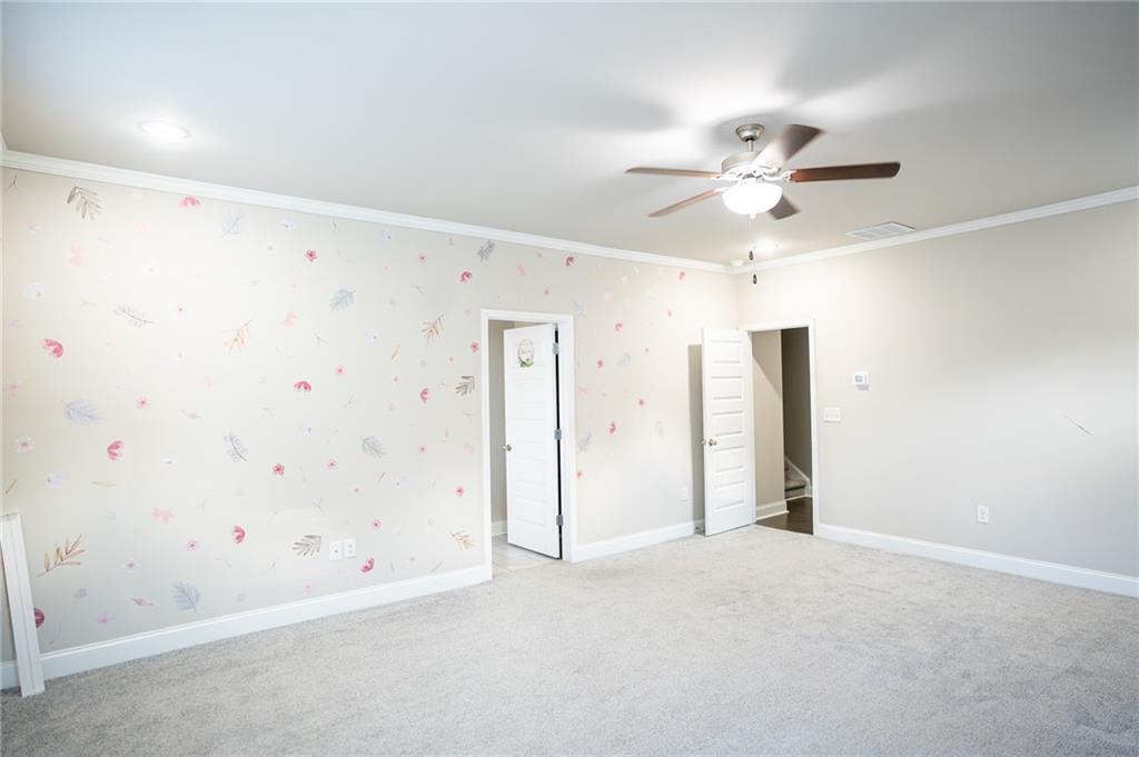 2215 Manor Pointe Drive Cumming, GA 30041 - Photo 10 of 25 wooden floor in an empty room