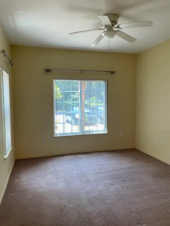 an empty room with windows