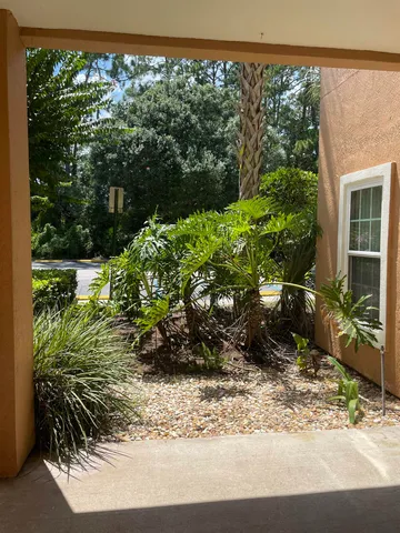 a view of a backyard of a house