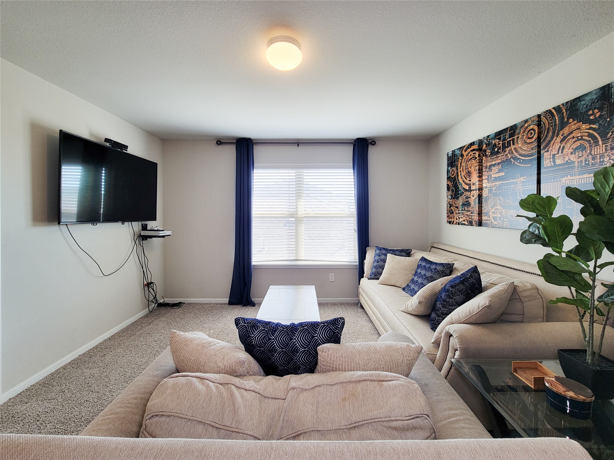 8003 Ecru Lane Rosharon, TX 77583 - Photo 26 of 43 a living room with furniture and a flat screen tv