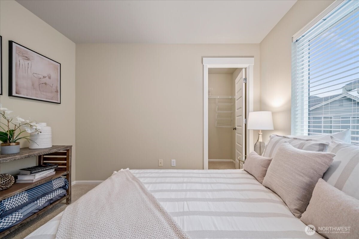18213 36th Avenue Southeast Bothell, WA 98012 - Photo 24 of 34 a bedroom with a bed and a couch