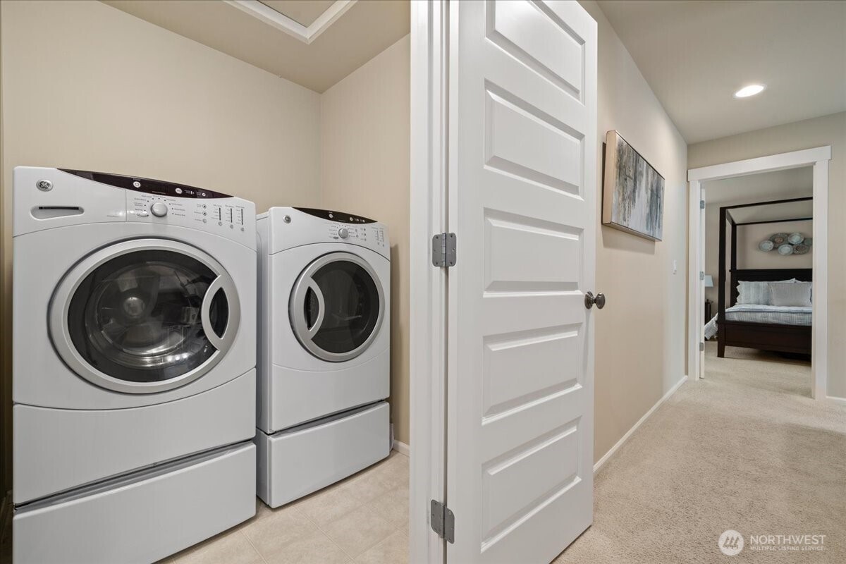 18213 36th Avenue Southeast Bothell, WA 98012 - Photo 28 of 34 a utility room with dryer and washer